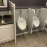 image displays the interior of a luxury restroom trailer